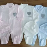 Комбинезоны для новорожденных
